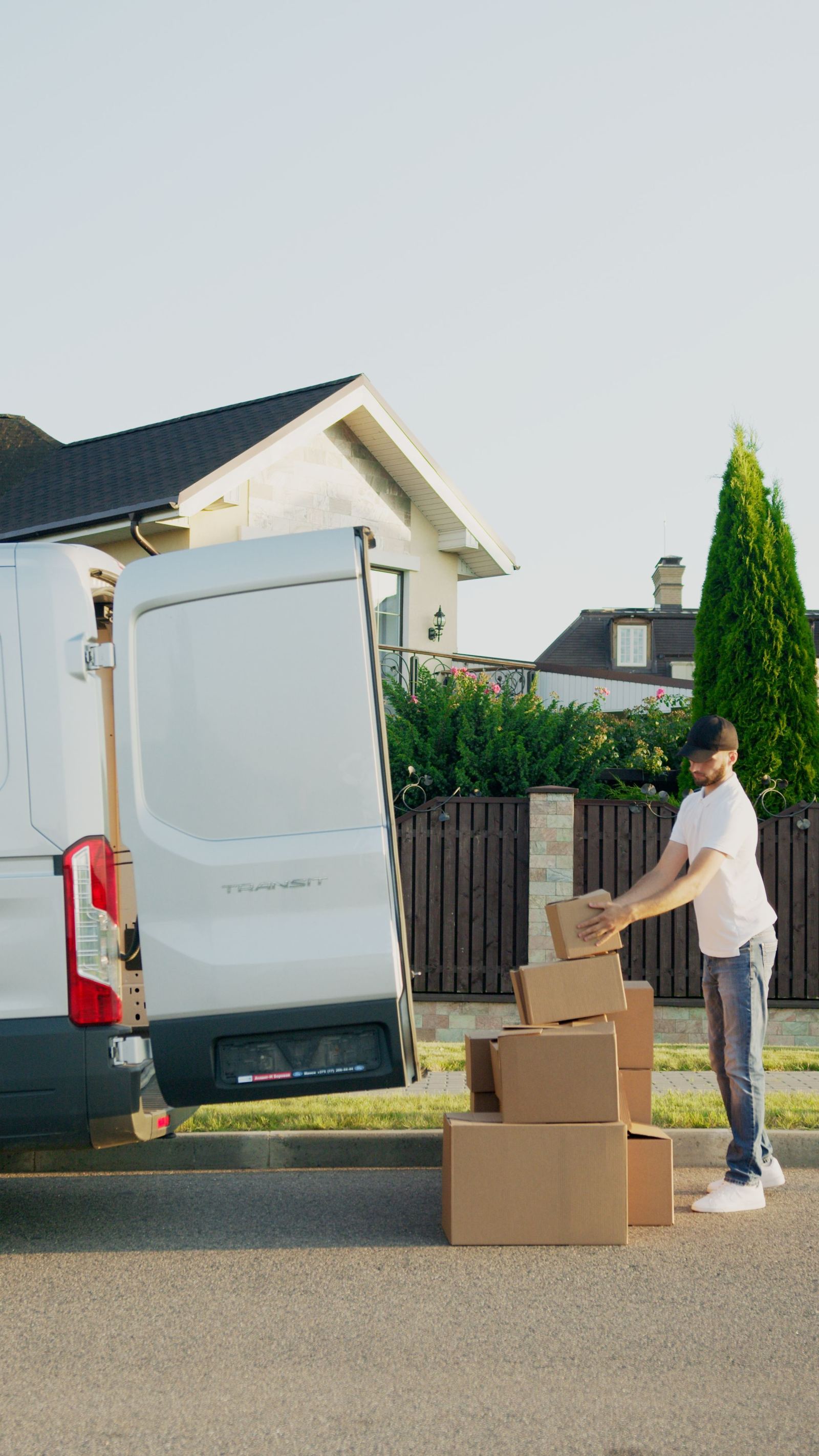 House Removal Driver Loading Van